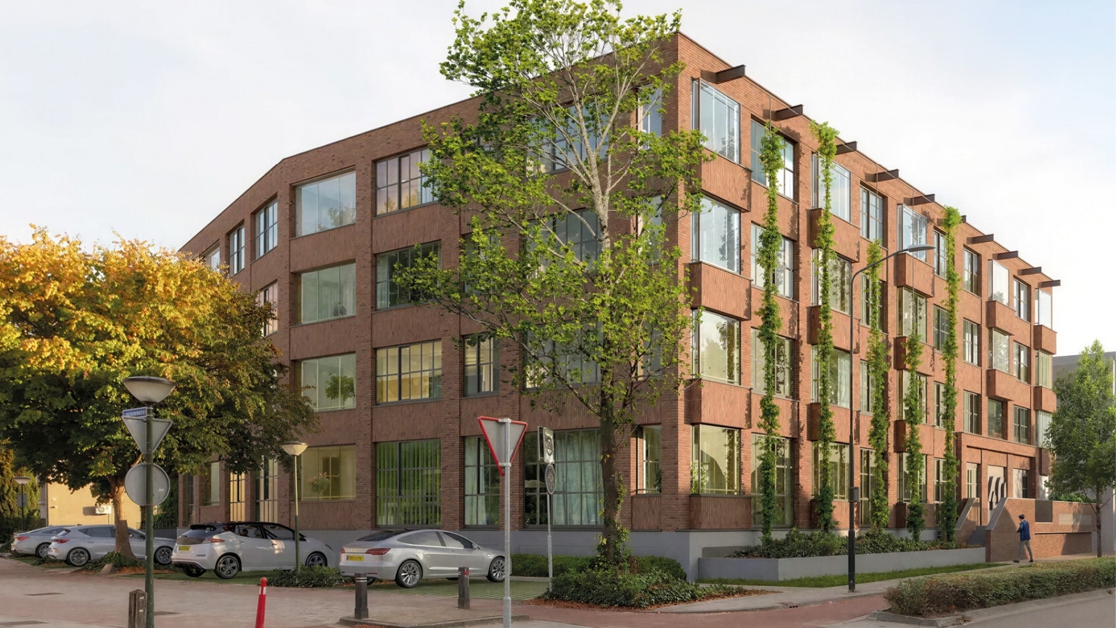 De Lichtspinnerij Geldrop met duurzame appartementen waarin het industriële textielverleden is vertaald naar eigentijdse architectuur.